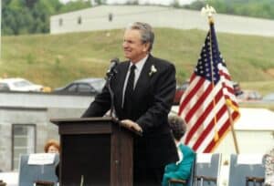 Carlton Colwell On Podium For Dedication